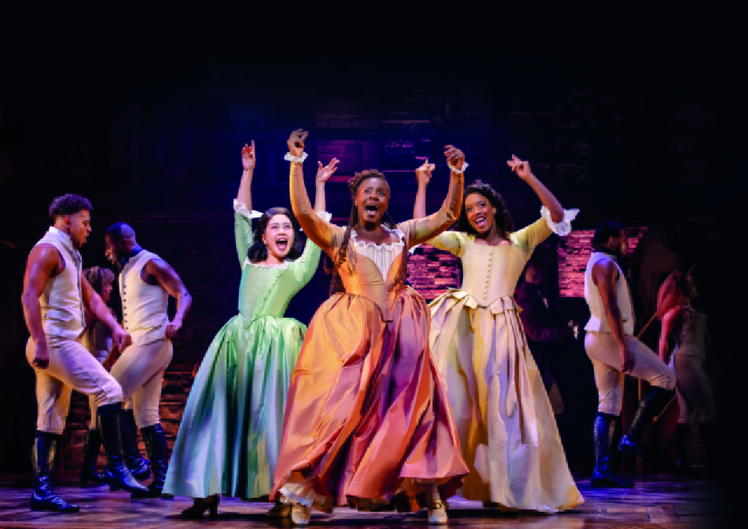 Performers on stage in period costumes, dancing energetically under bright lights.