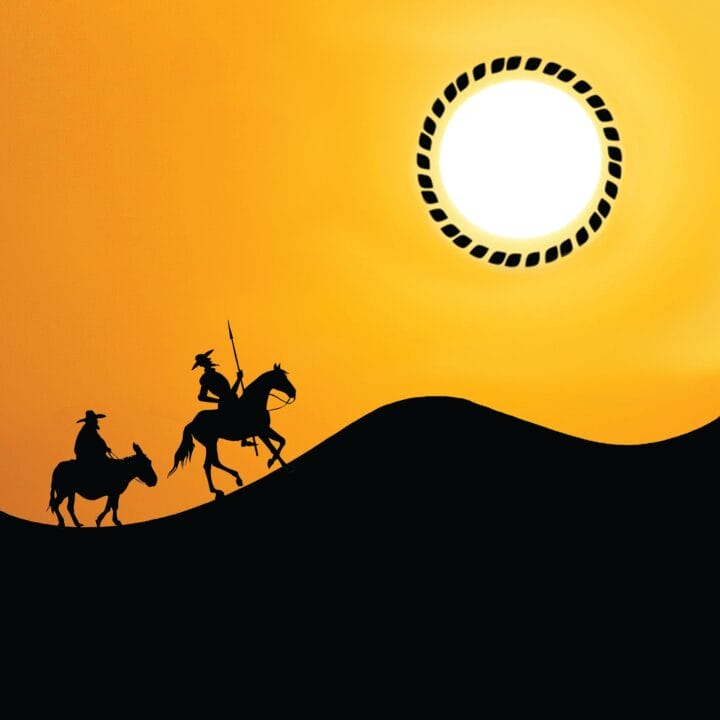 Silhouettes of two riders on animals travel across sand dunes at sunset, with a bright sun surrounded by a patterned ring in the sky.