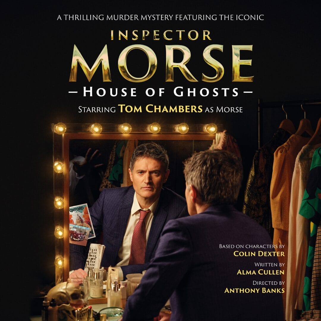 A man in a suit sits at a dressing table, surrounded by theater lights and costumes, gazing into the mirror; "Inspector Morse: House of Ghosts" promotional text overlays the image.