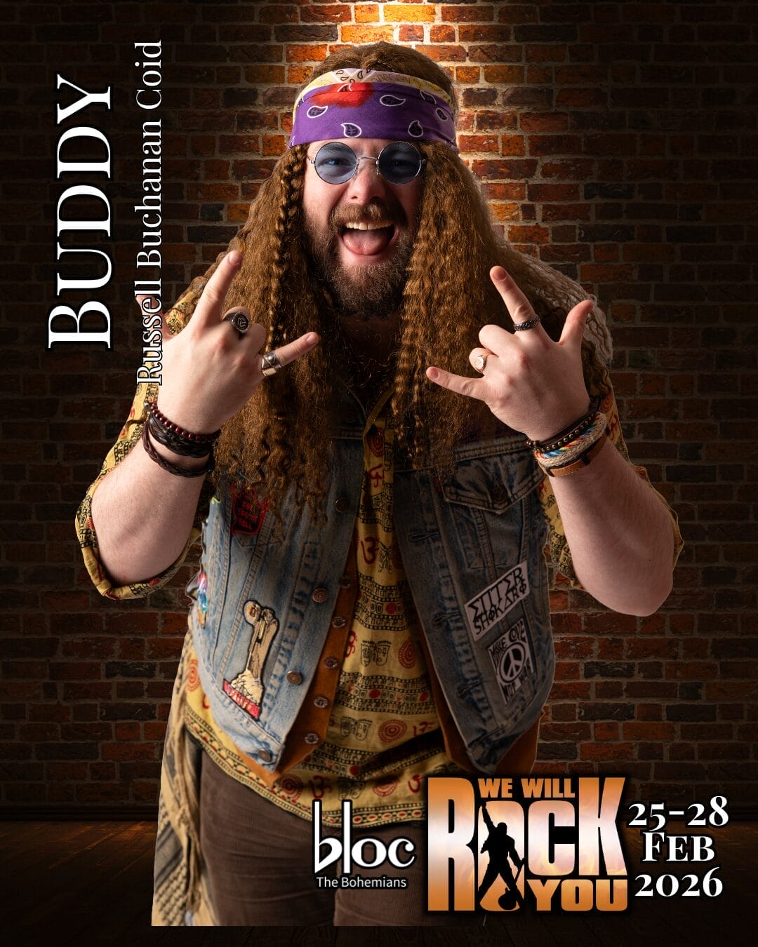 A man with long curly hair and a beard wears a bandana, sunglasses, a denim waistcoat with patches, and rings. He makes rock hand gestures and smiles. Text reads "BUDDY, Russell Buchanan Coid." Get ready for We Will Rock You event details!.