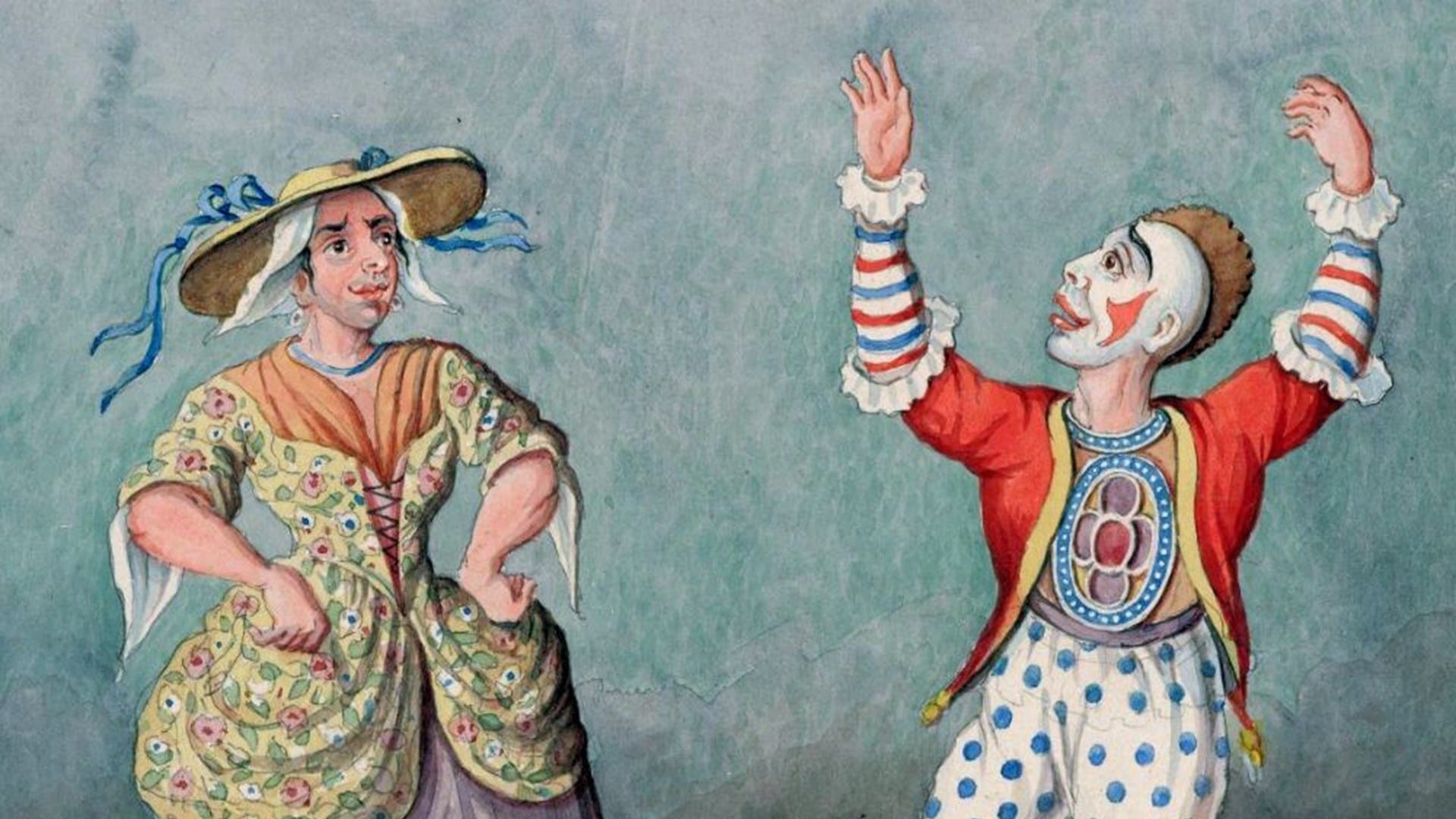 Two performers in colorful costumes and makeup, one in a floral dress and wide-brim hat, the other in polka-dotted pants and striped sleeves, stand against a plain background.