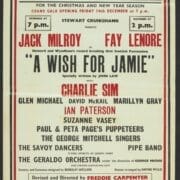 Red poster printed on cream paper with some black details, advertising "A Wish for Jamie" pantomime at King's Theatre, Edinburgh, listing cast, dates, and production details.