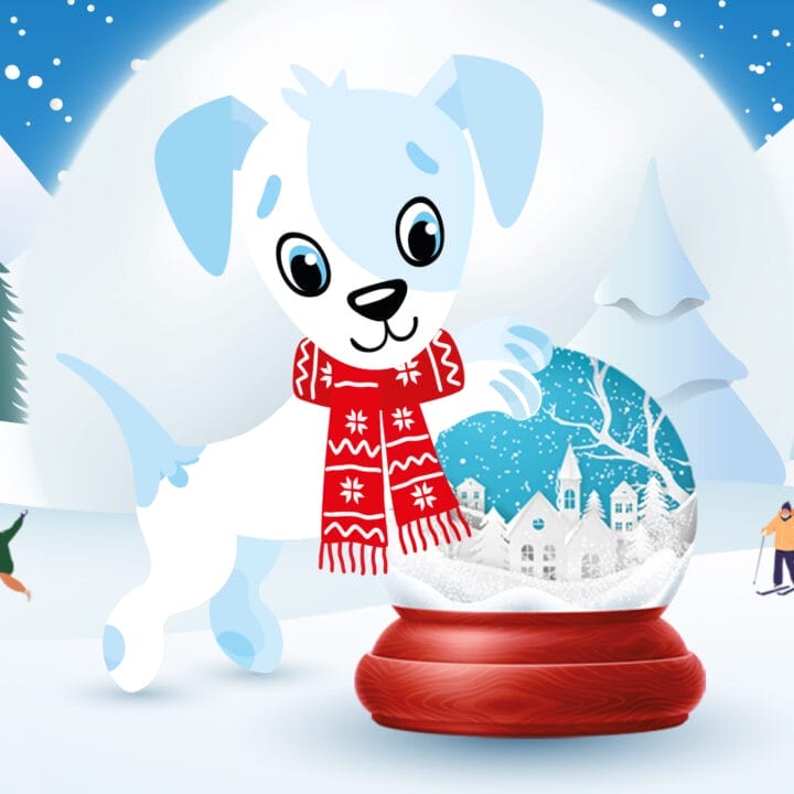 A cartoon puppy wearing a red scarf stands by a snow globe in a snowy landscape with mountains and people enjoying winter activities.