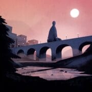 A giant statue sits on a stone bridge over a river at sunset, with buildings in the background and a tree in the foreground.