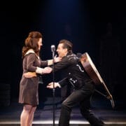 Johnny grabbing June on stage