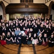 A large group of people smiling