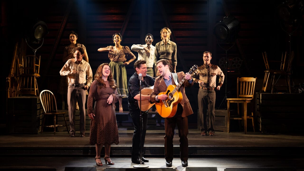 Country band singing on stage