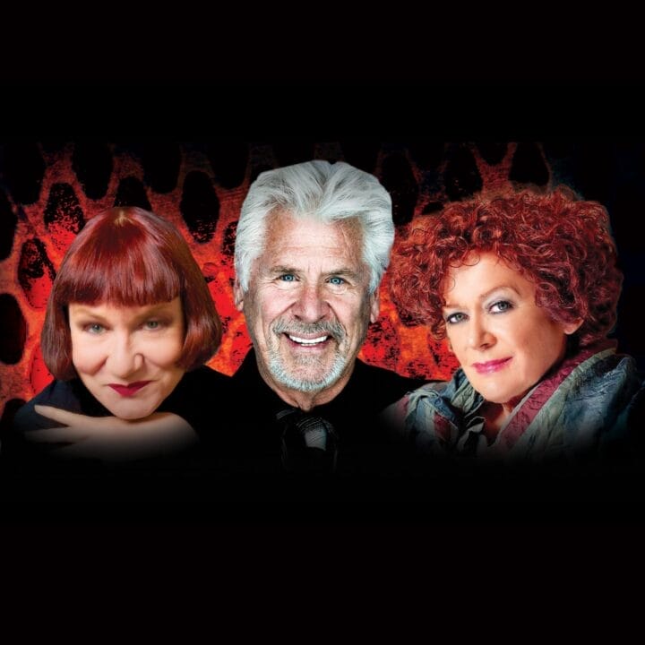 Three older adults, two women and one man, pose in front of a red and black textured background, all facing forward and smiling or with neutral expressions.